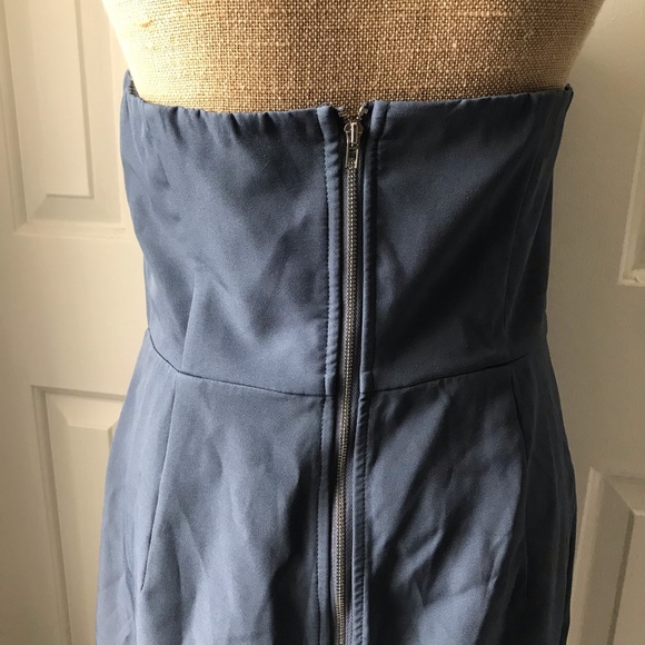 Slip leg romper with pockets in blue - Picture 5 of 5